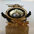 Early French Marble & Patinated Bronze Mantel Clock.  Circa 1825.